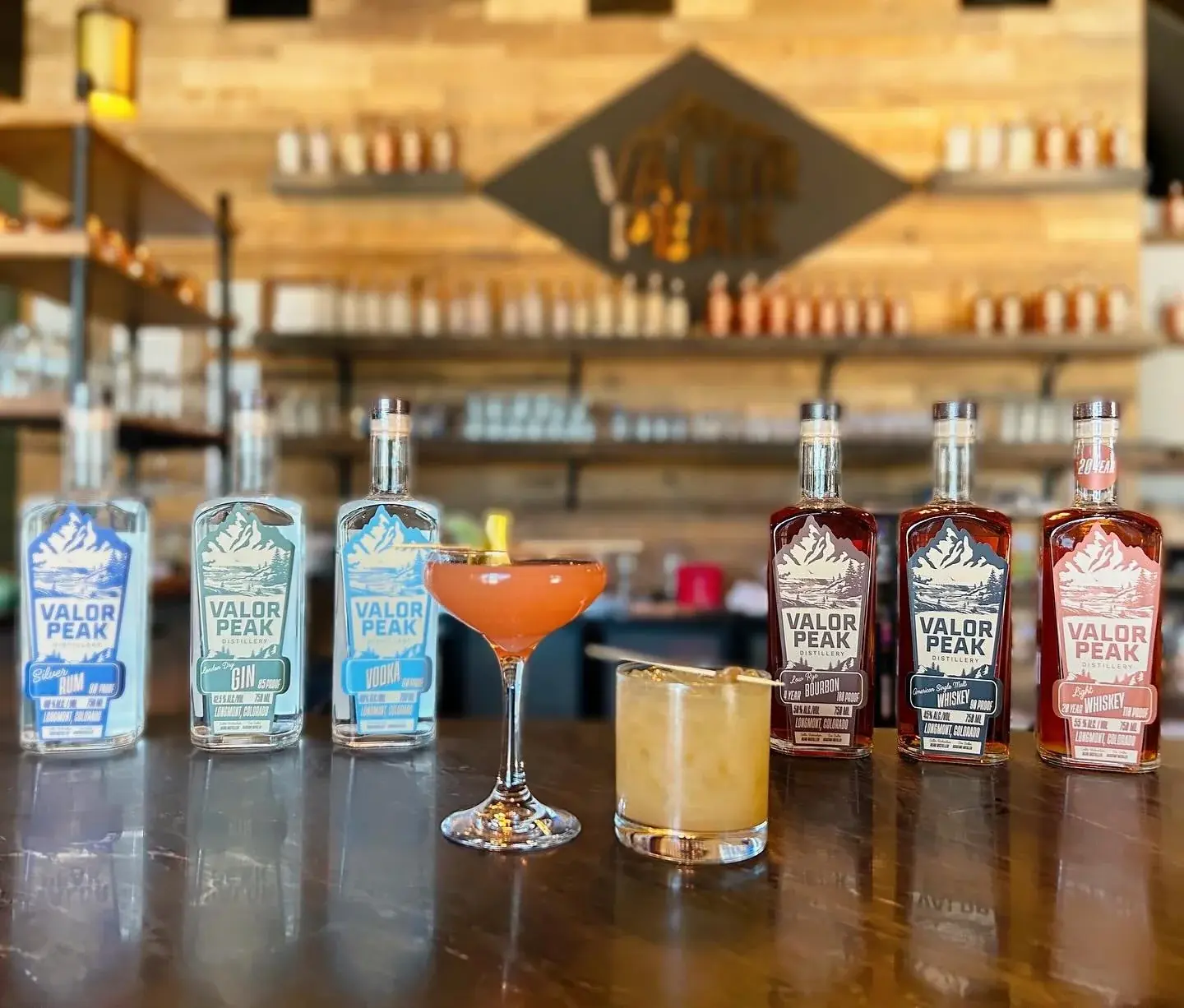 Valor Peak spirits and cocktails lined up on the tasting room counter