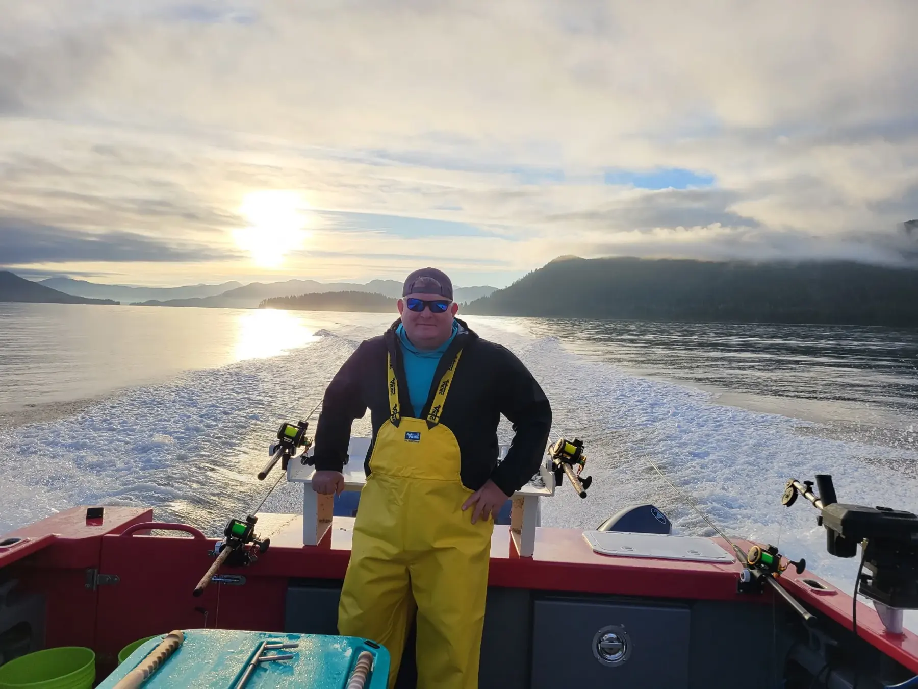 John Humphrey on a fishing boat in the mountains