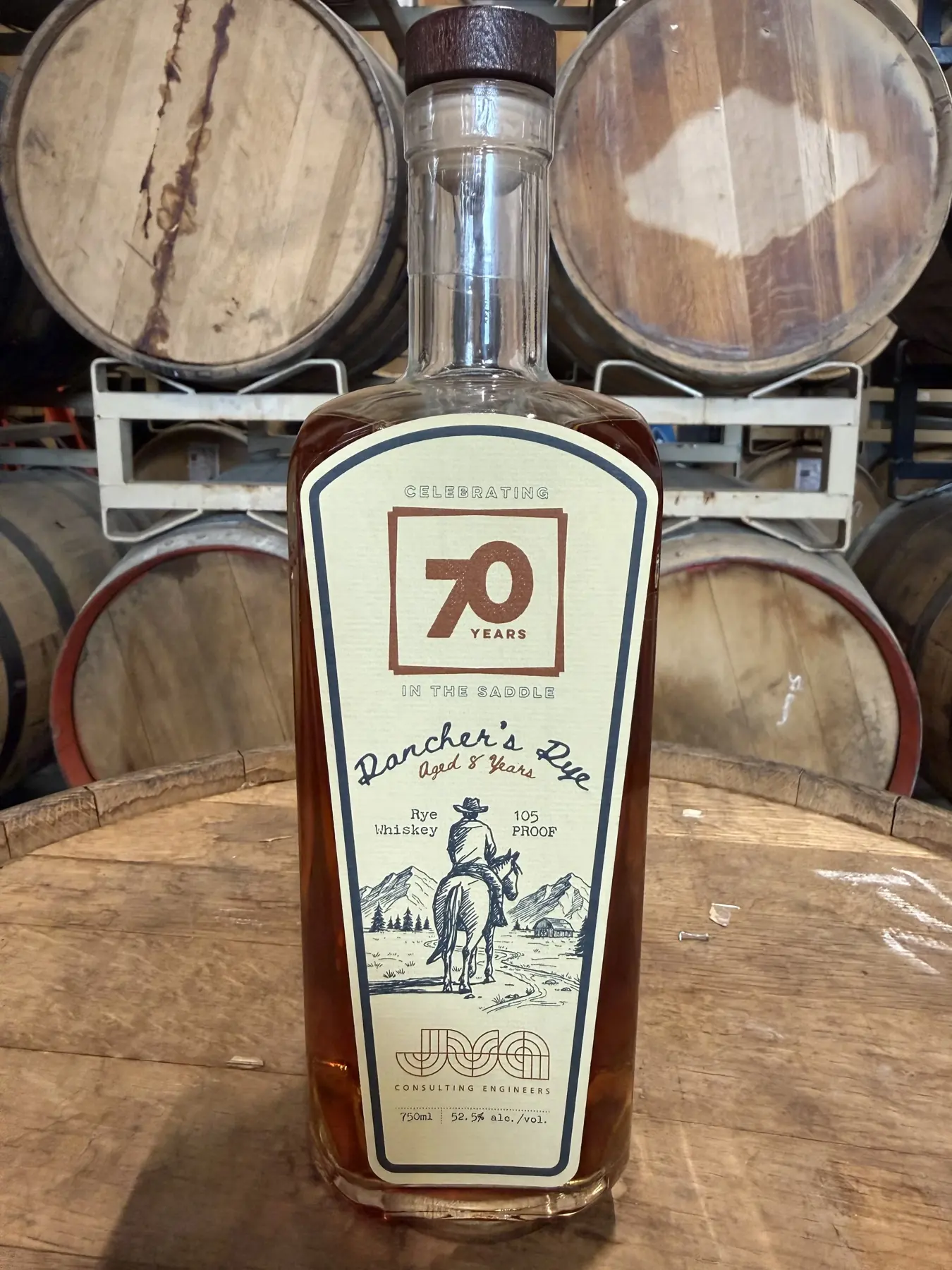 JVA Consulting Engineers 70th Anniversary Barrel Selection bottle photographed in the Valor Peak barrel room