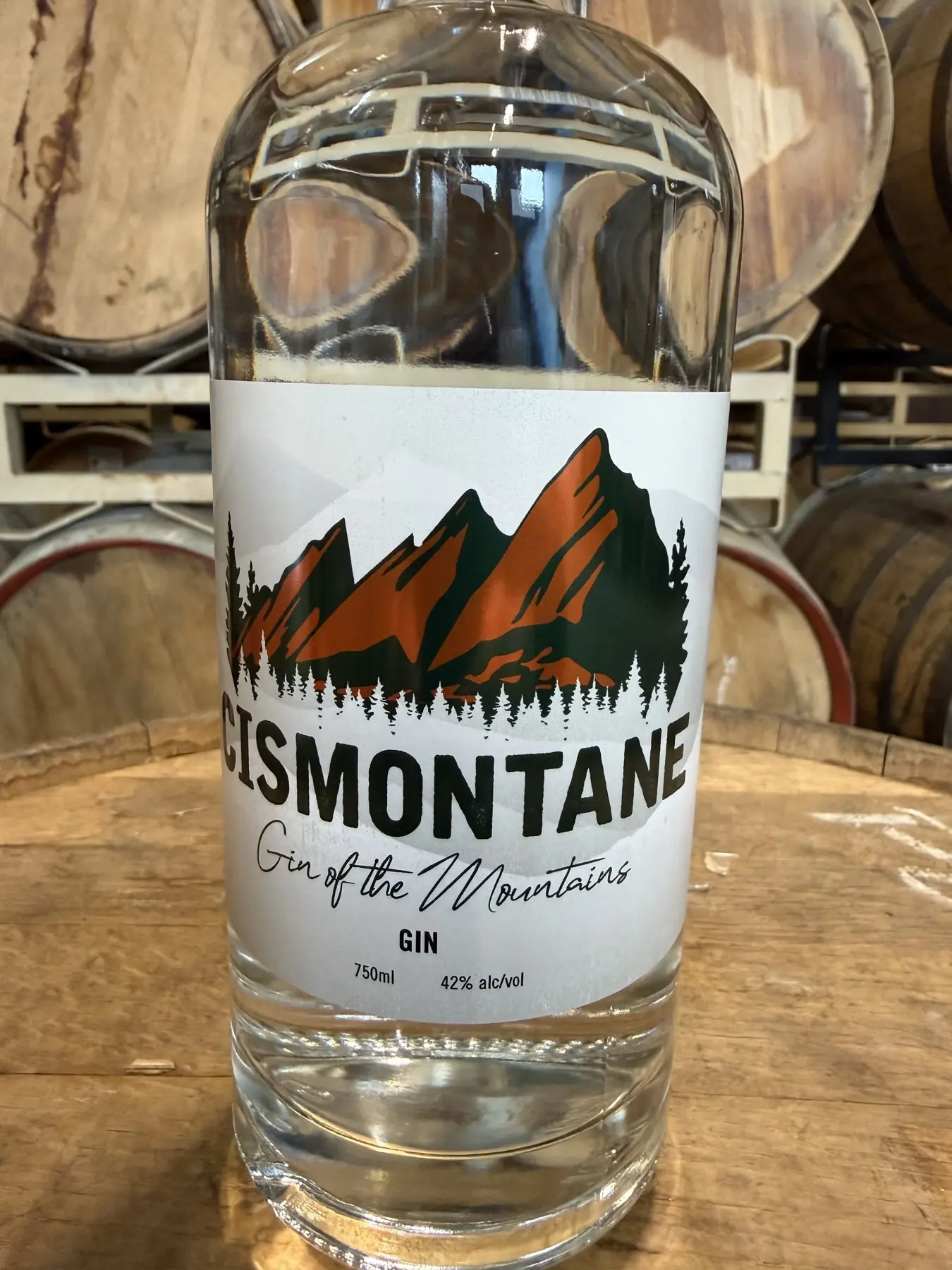 Deep Roots Distilling Contract Distillation Partner bottle photographed in the Valor Peak barrel room