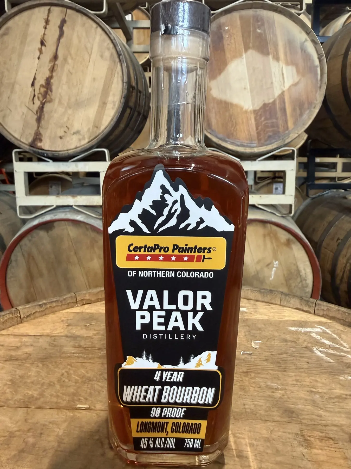 CertaPro Painters of Northern Colorado Client Celebration Barrels bottle photographed in the Valor Peak barrel room
